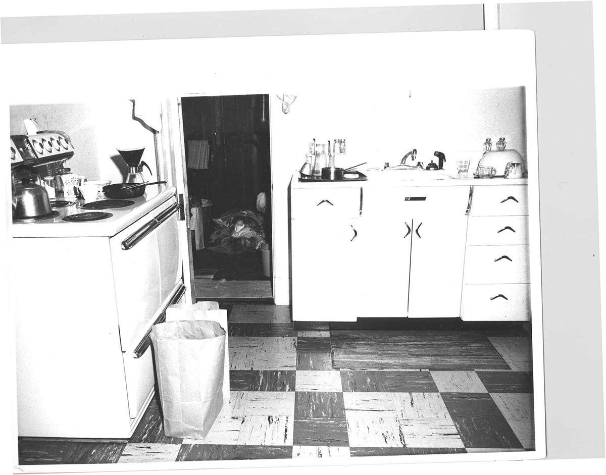 Police photographed Alma List's body, in the storeroom off of her kitchen on the third floor.