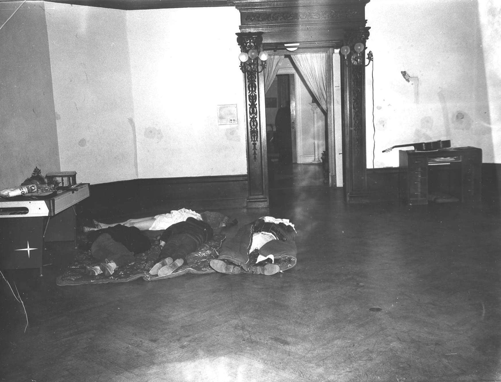 A police photo of the bodies as they were discovered in the ballroom Dec. 7, 1971.